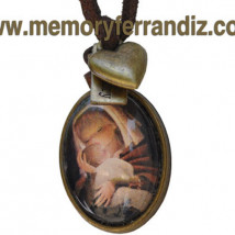 Medalla bronce ovalada con cristal lupa de 2x3 cm: "Virgen canela". Cinta de ante café y mini corazón dorado.
